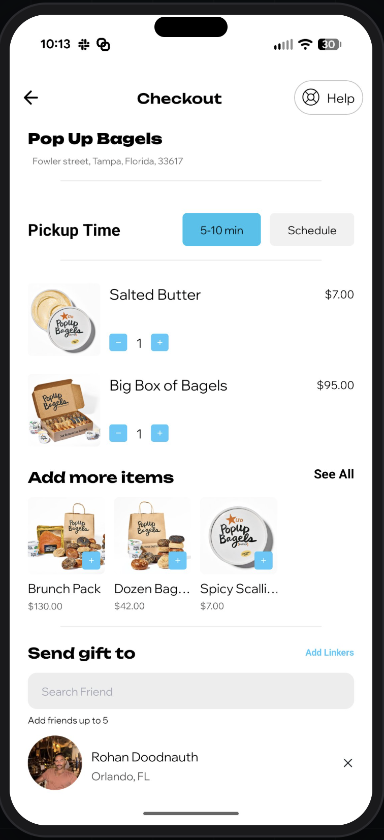 OPA! gifting at checkout — a customer adds friends to send a personalized food gift from a favorite restaurant